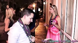 A young woman performs oral sex on multiple men during Mardi Gras and receives a facial